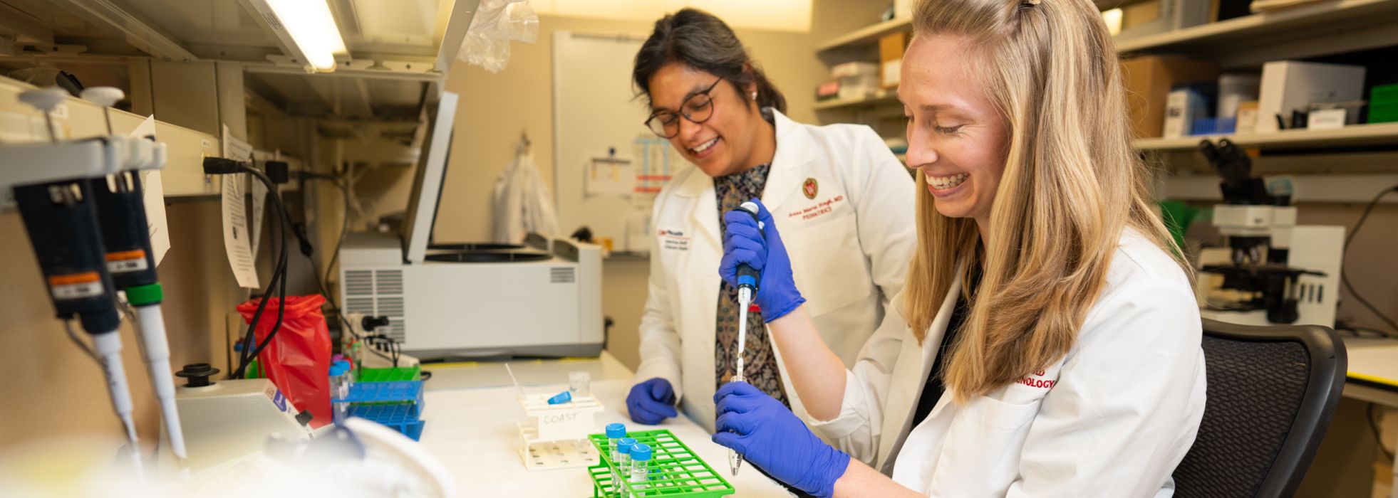 Drs. Singh and a fellow working in the lab