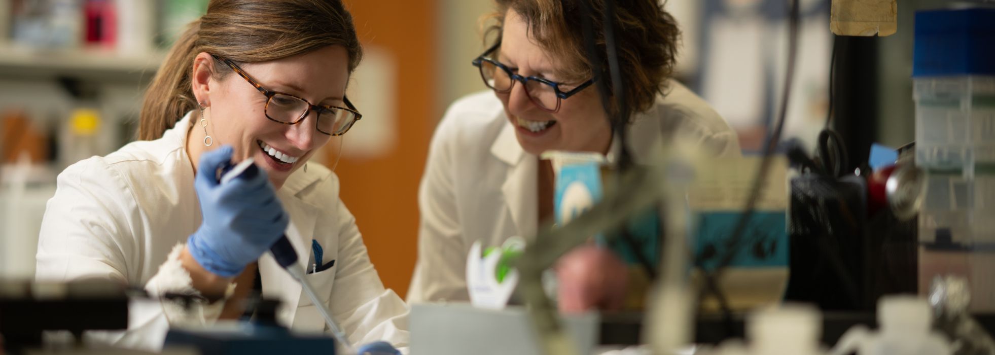 Lynn M. Schnapp, MD, in lab with a member of her research team.