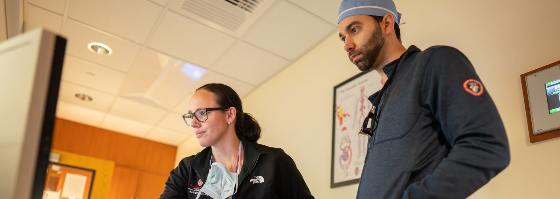 Dr. Kelly Schmidt and a cardiology fellow in a simulation training.