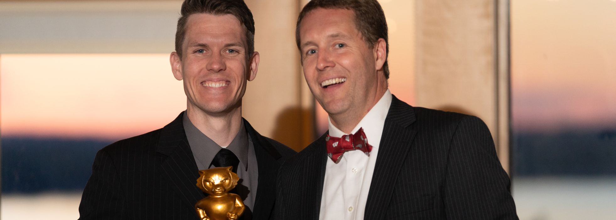 Hem/Onc fellow smiling in photo with Dr. Sam Lubner