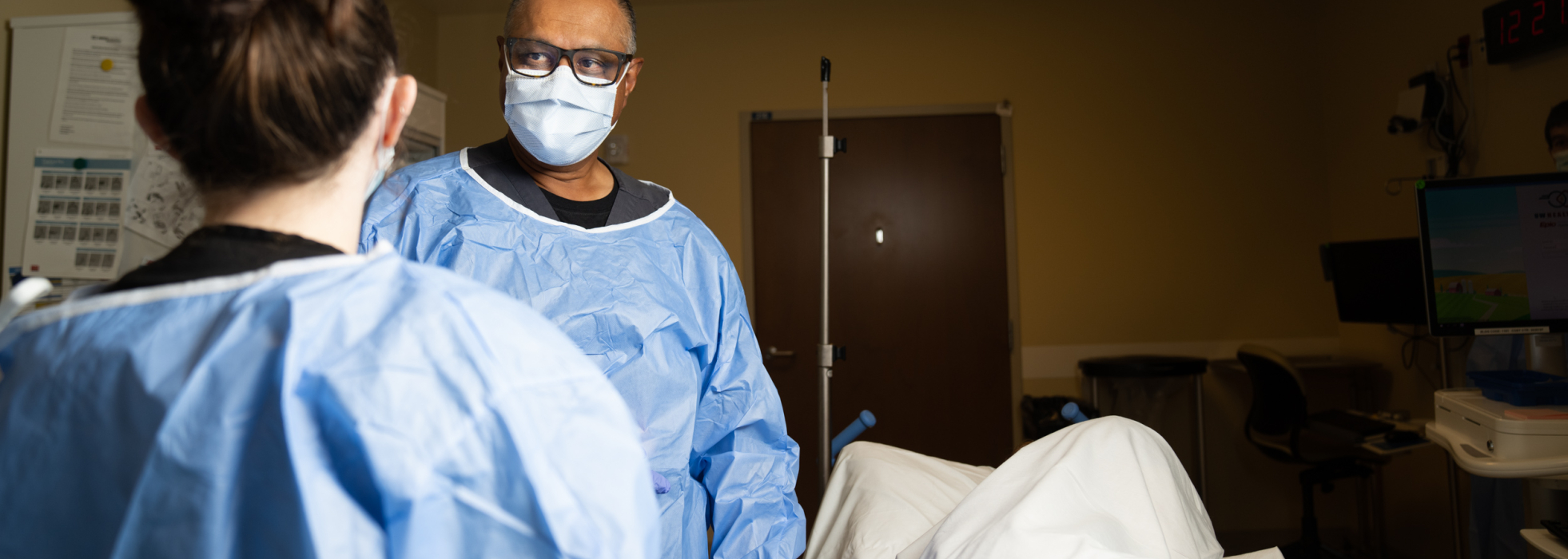 Photo of Dr. Sharif in clinical setting