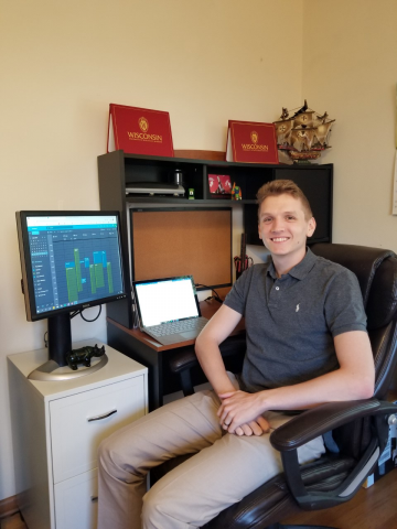 Above, Rory Bade at his remote work space. 