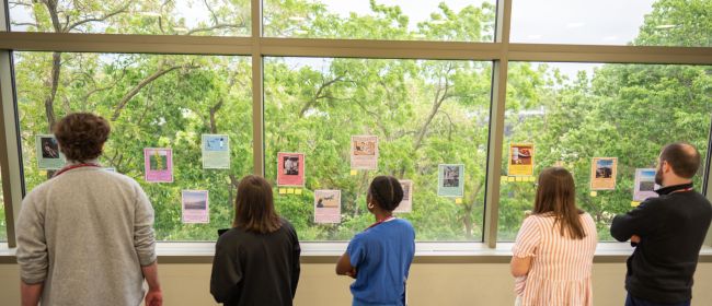 trainees and faculty gathered to the read the stories during an ice cream social.