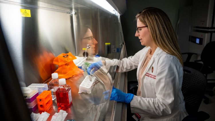 Hilary Faust, MD, MS, in the lab.
