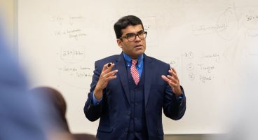 Dr. Fahad Aziz in the classroom.