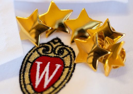 UW logo with stars