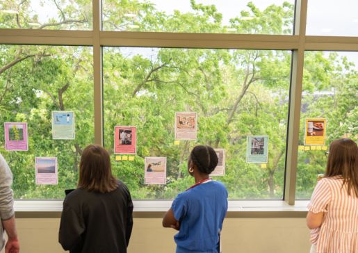 trainees and faculty gathered to the read the stories during an ice cream social.